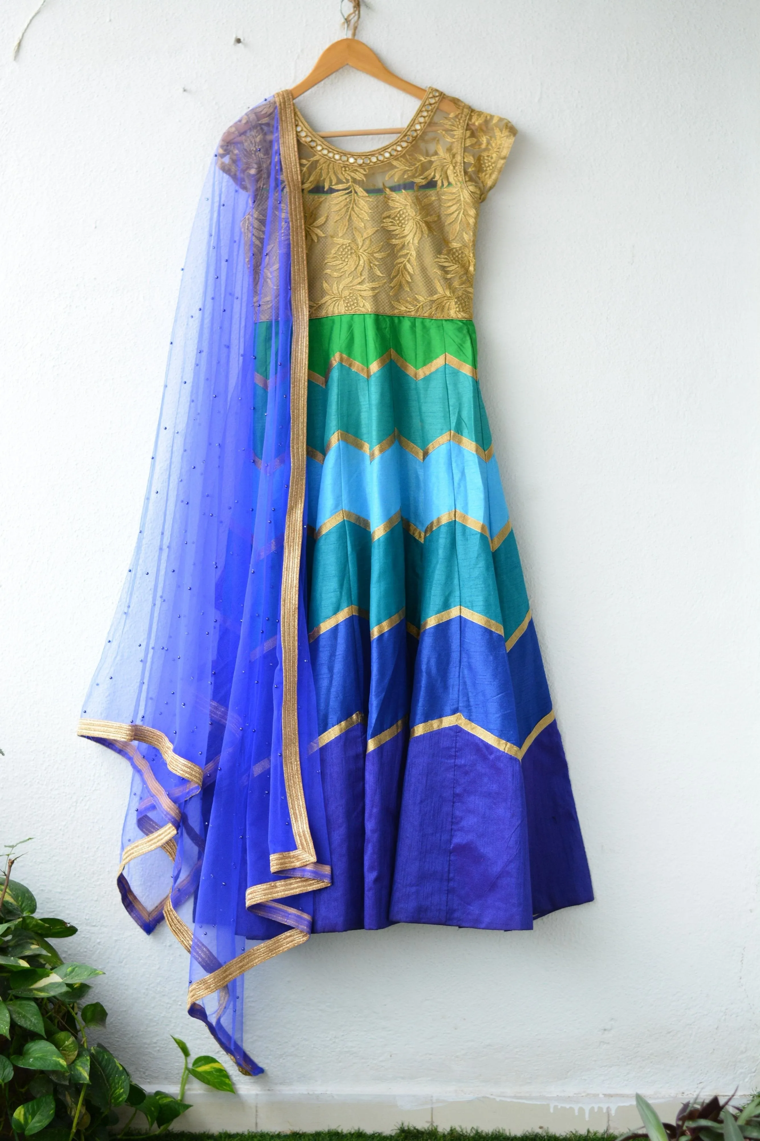 Blue Layred Salwar with golden embroidery top