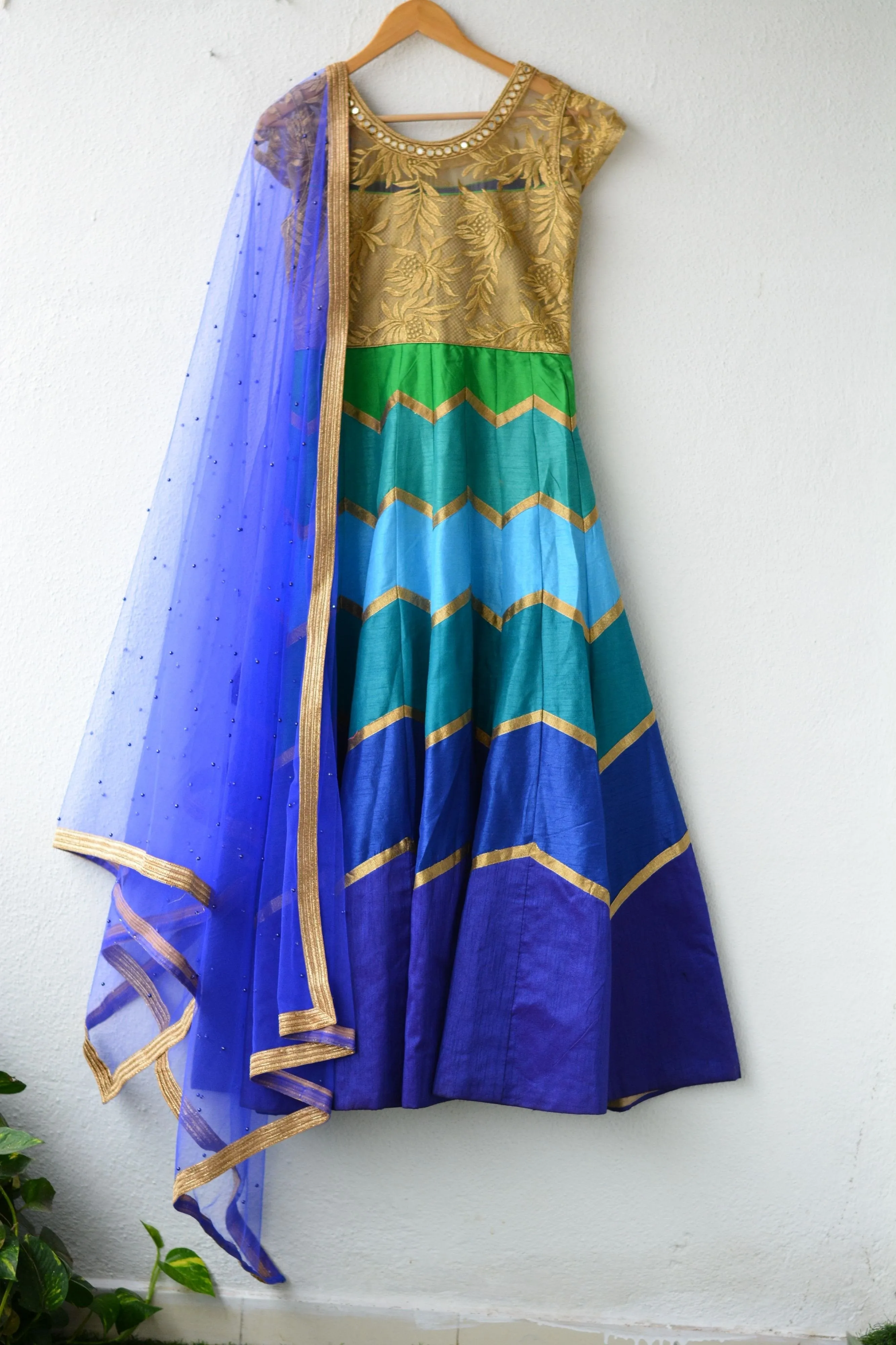 Blue Layred Salwar with golden embroidery top